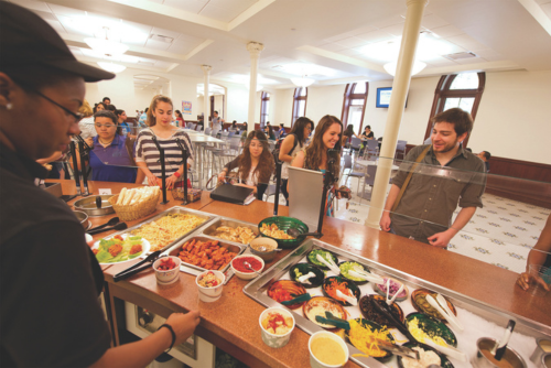 students in line at the cafeteria dining hall