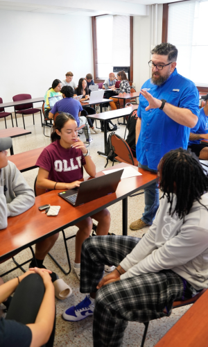 graduate students with professor