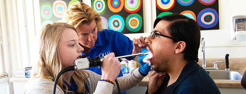 Student and professor conducting oral exam