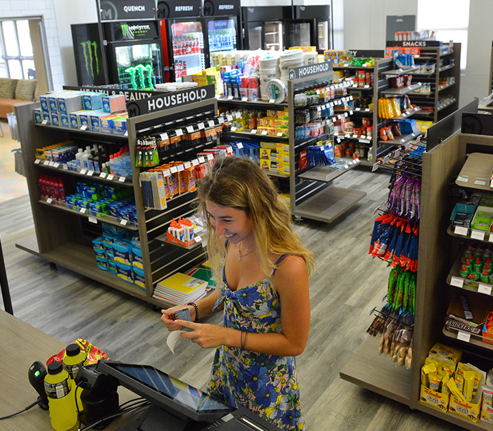 person in campus convenience store