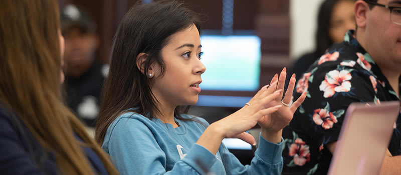 Female student speaking in class